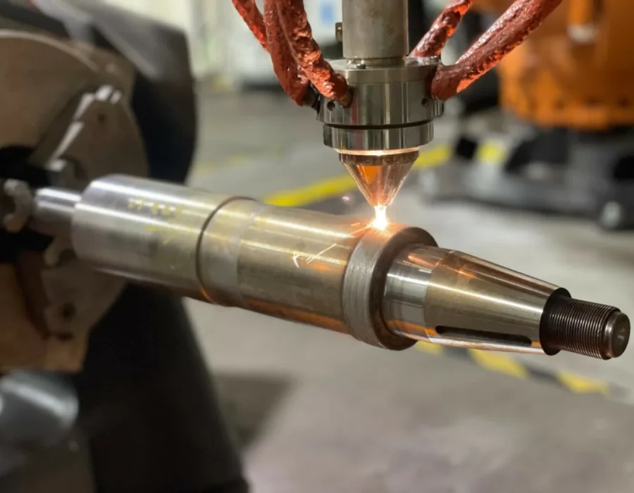 Cladding overlay on a metal shaft; image supplied in the Robotic Cladding presentation.